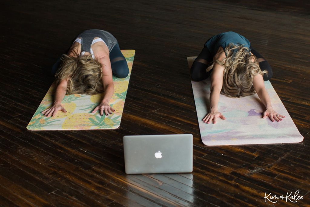 In child's pose after a LES MILLS on Demand BODYFLOW workout