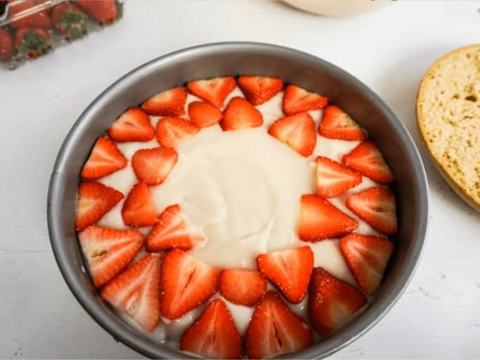 layering your Strawberry Shortcake Cheesecake