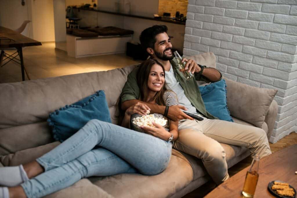 young couple watching tv