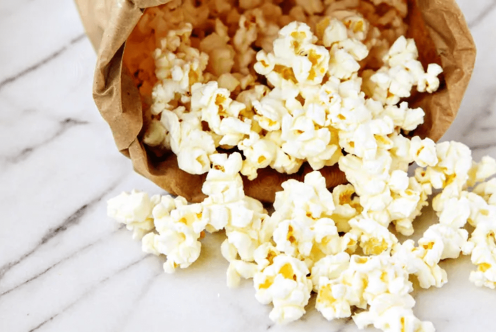 homemade popcorn in a paper bag