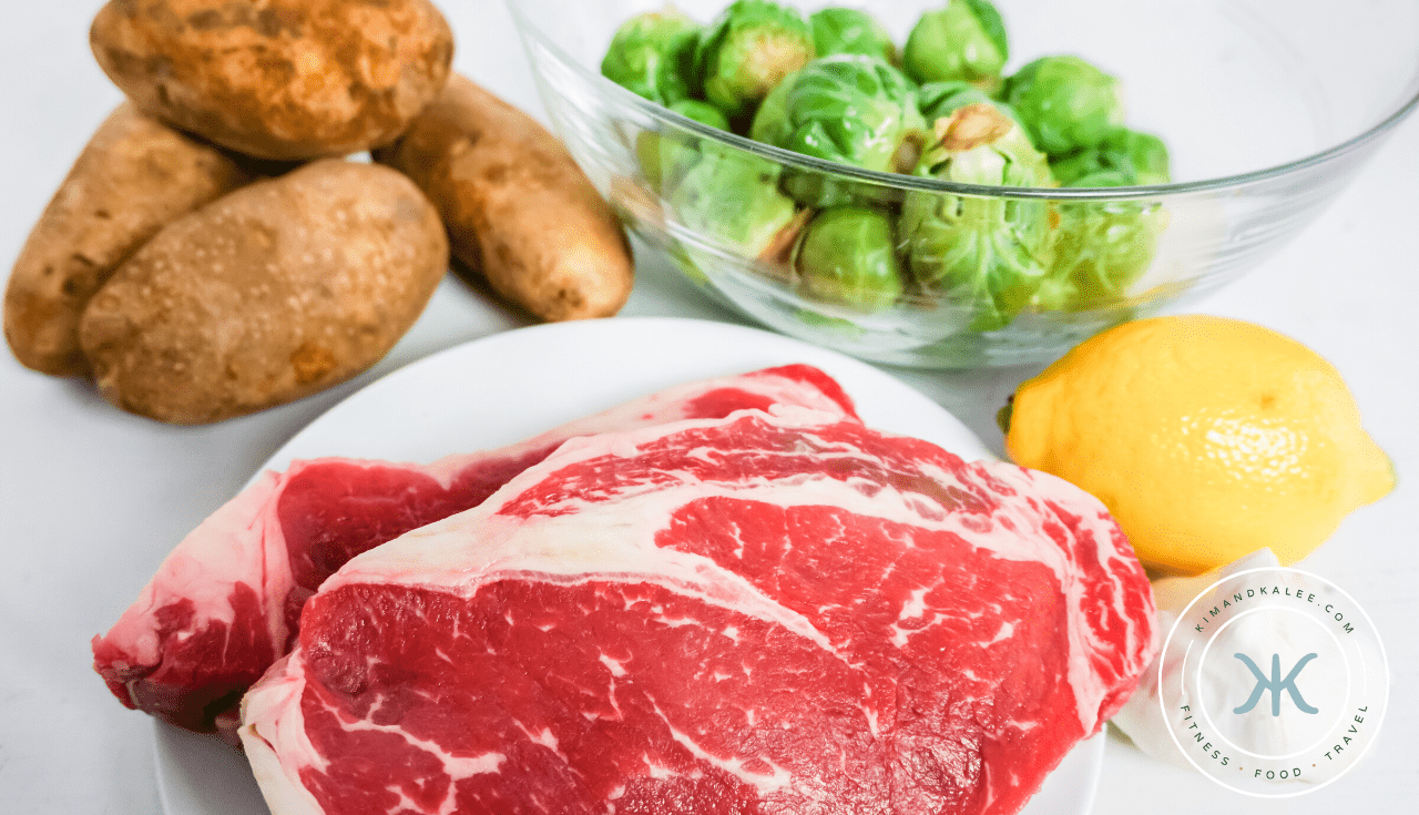 Making garlic steak and potato foil packs