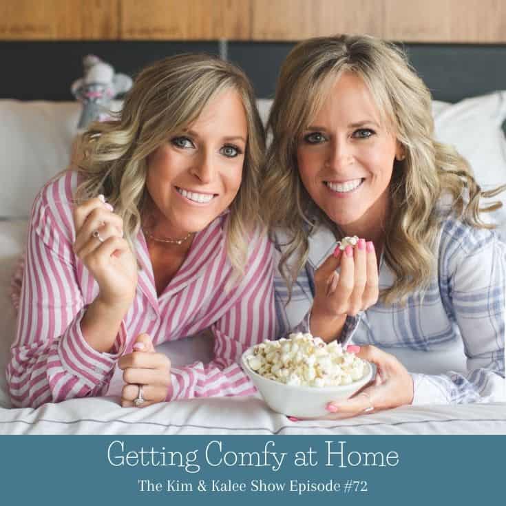 Kalee & Kim laying on bed eating popcorn