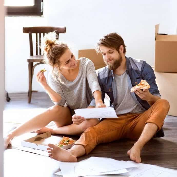 couple discussing leather anniversary gifts