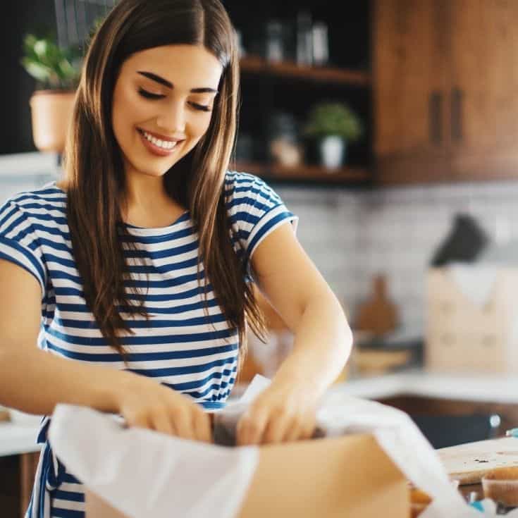 woman putting together a care package