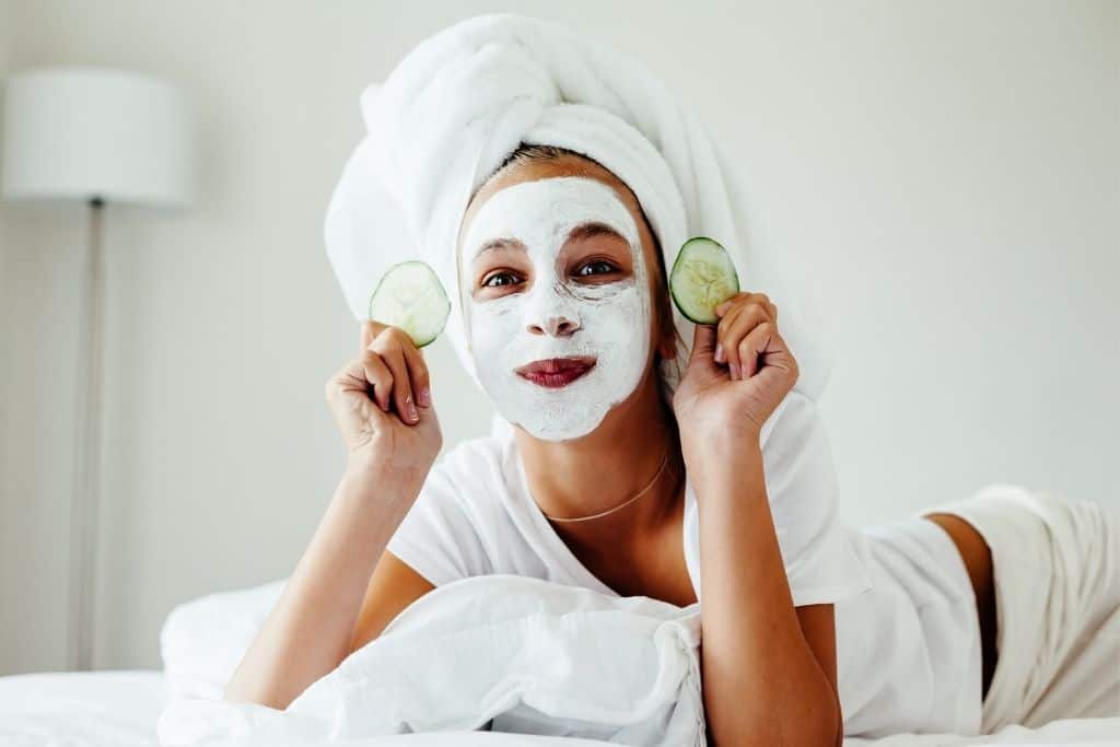 girl with a facial mask on for a spa day