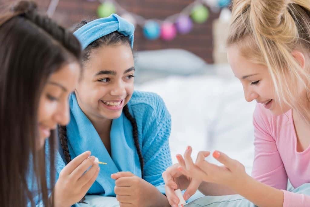 tweens painting each others nails