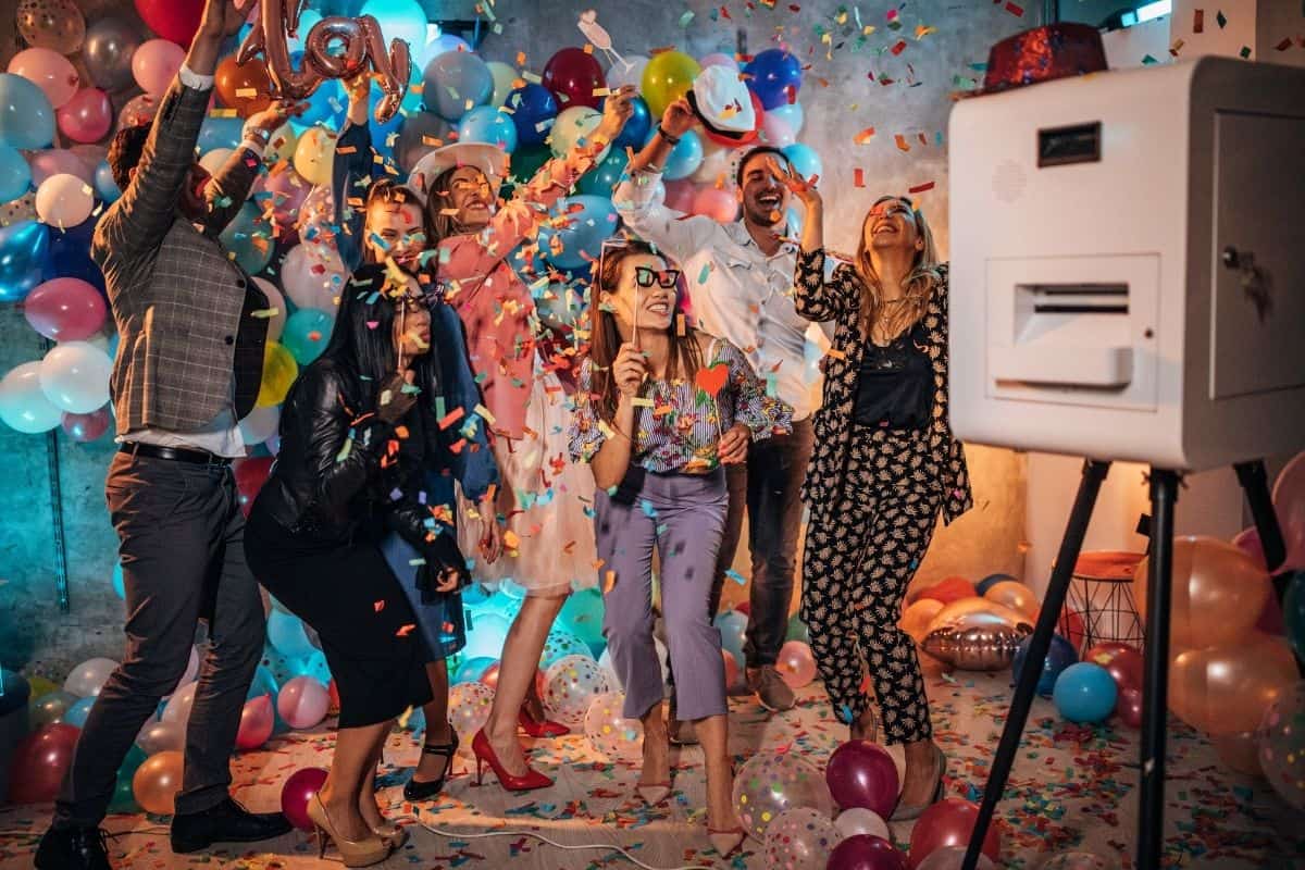 friends in a homemade photo booth