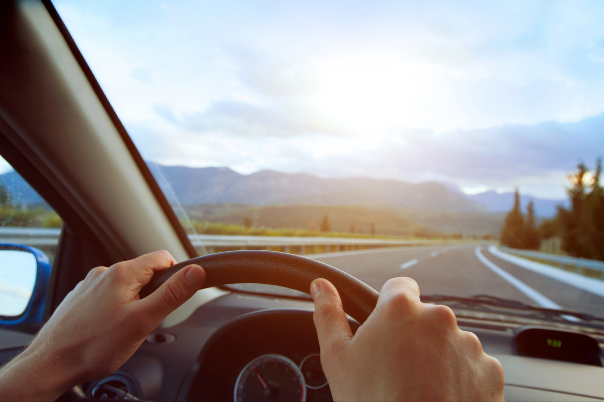 hands on a steering wheel