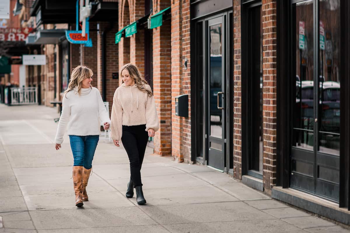 Kim and Kalee walking down to shop