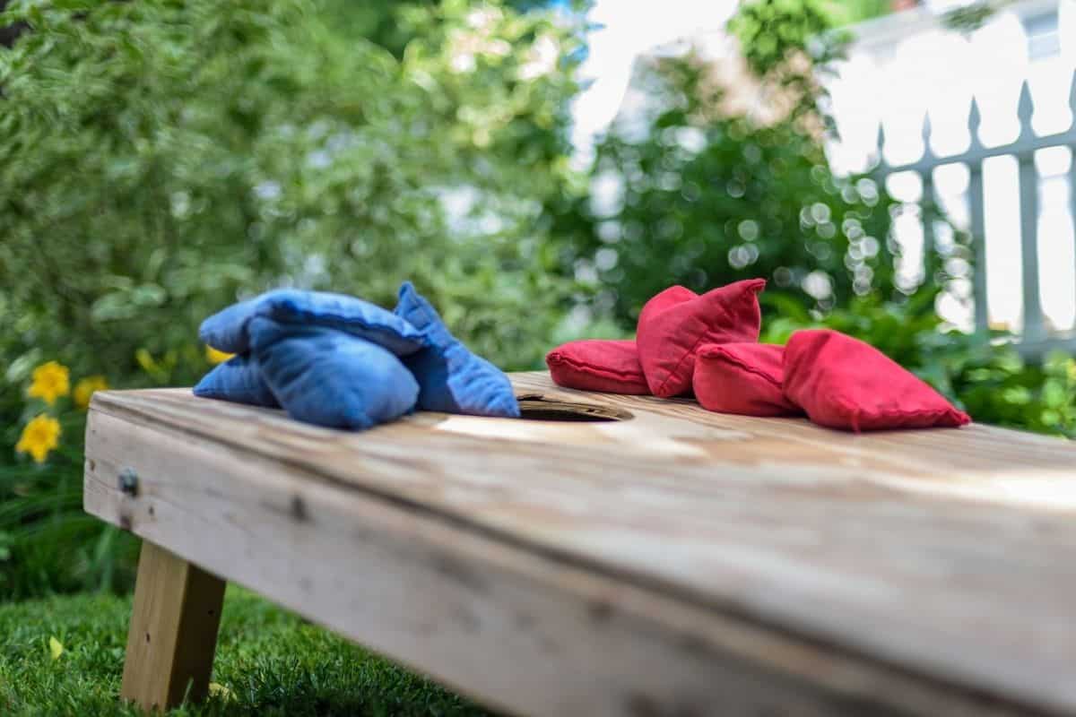 cornhole board and bags