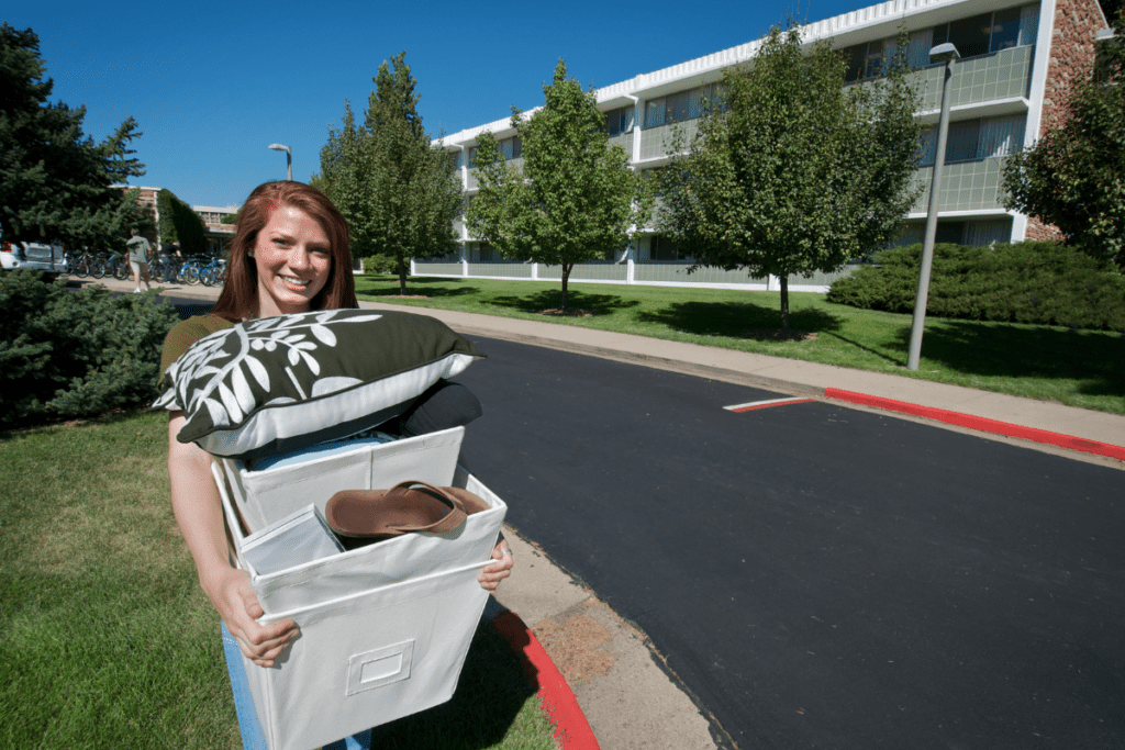 college age girl moving into a dorm