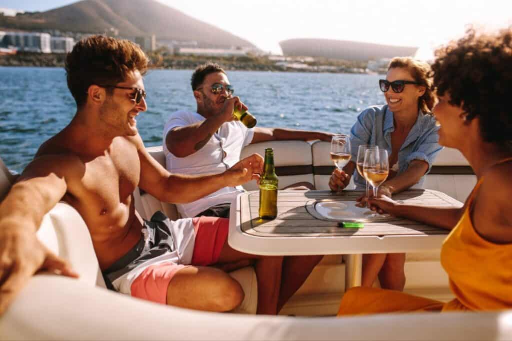 friends drinking on a boat