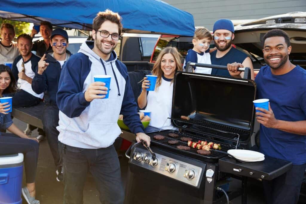 group of friends outside at a sports themed party