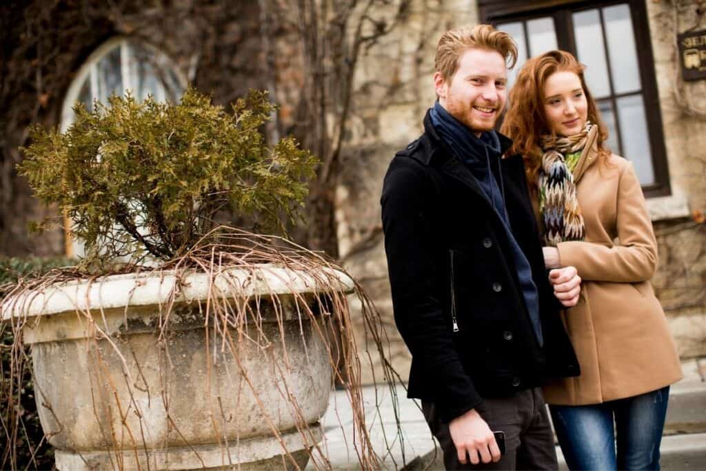 red haired couple outside