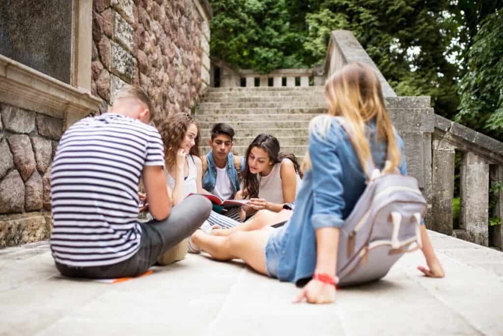 teens outside of a school