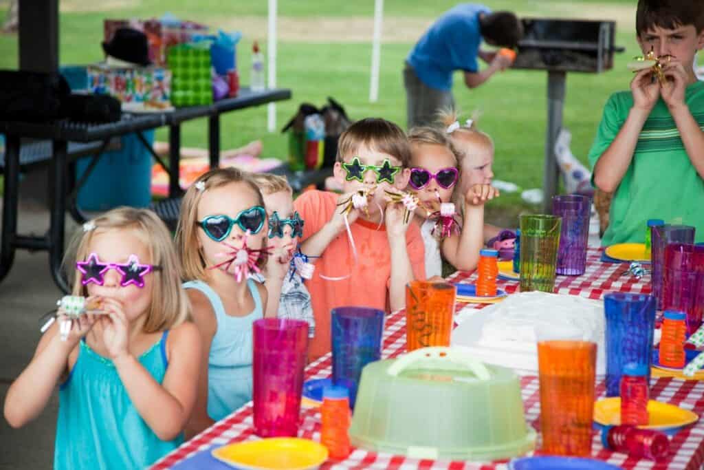 kids at a boys birthday party at the park