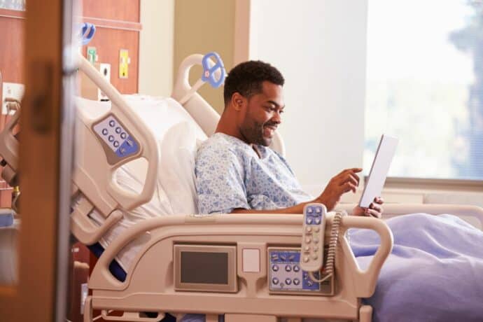 black man in hospital bed