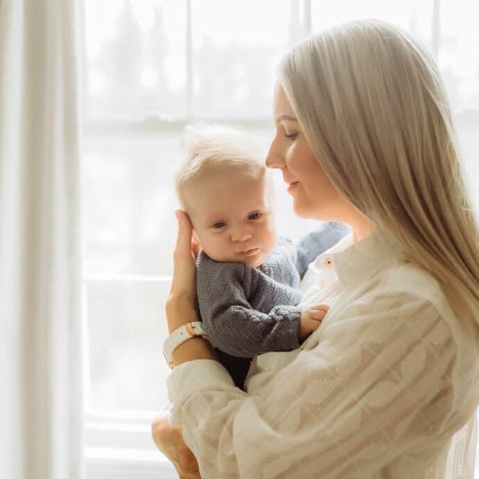 mom holding her baby son