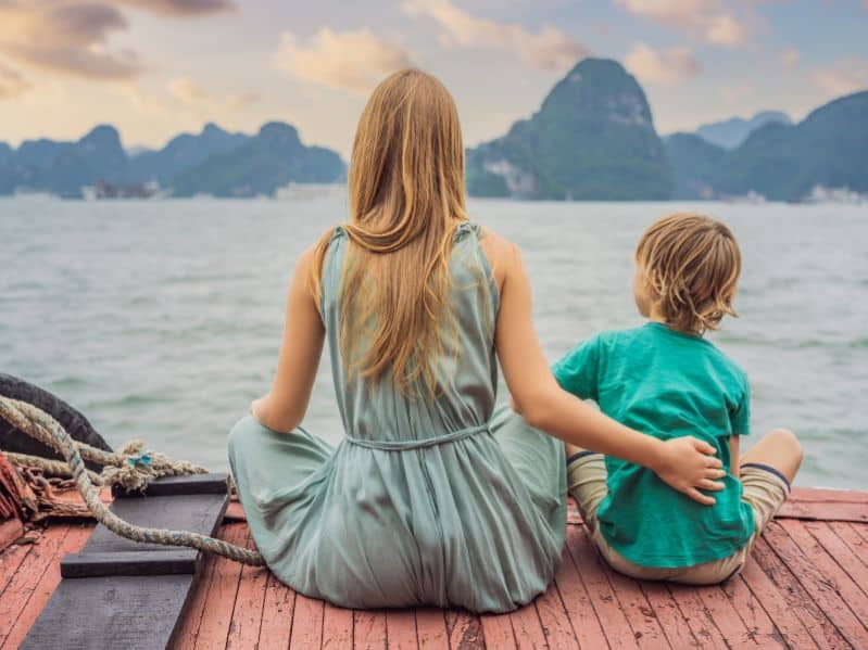 mom and son on vacation at the lake