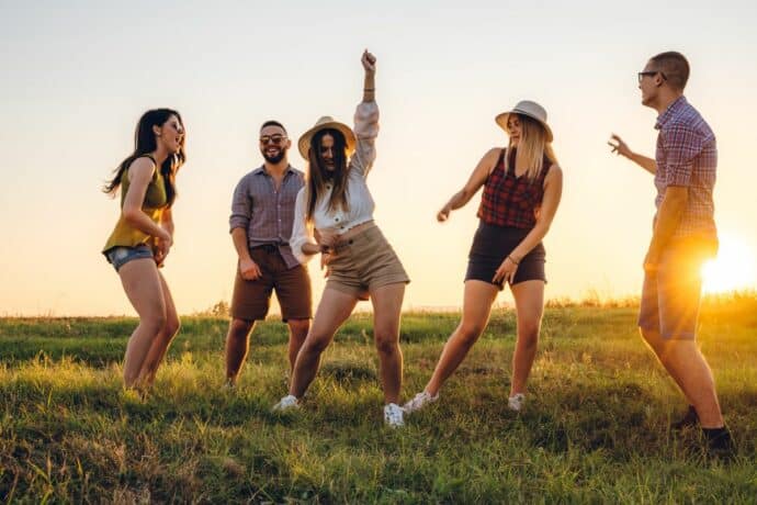 friends dancing outside