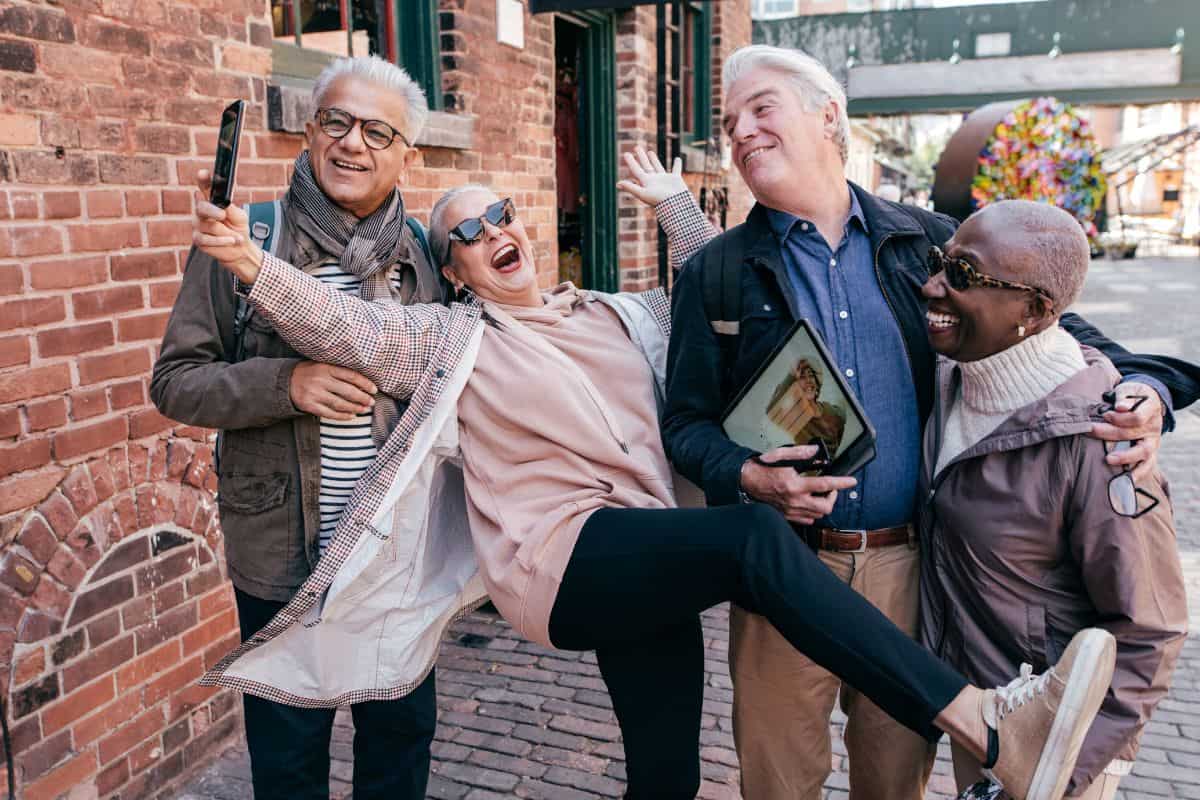 friends in their 60s having run outside