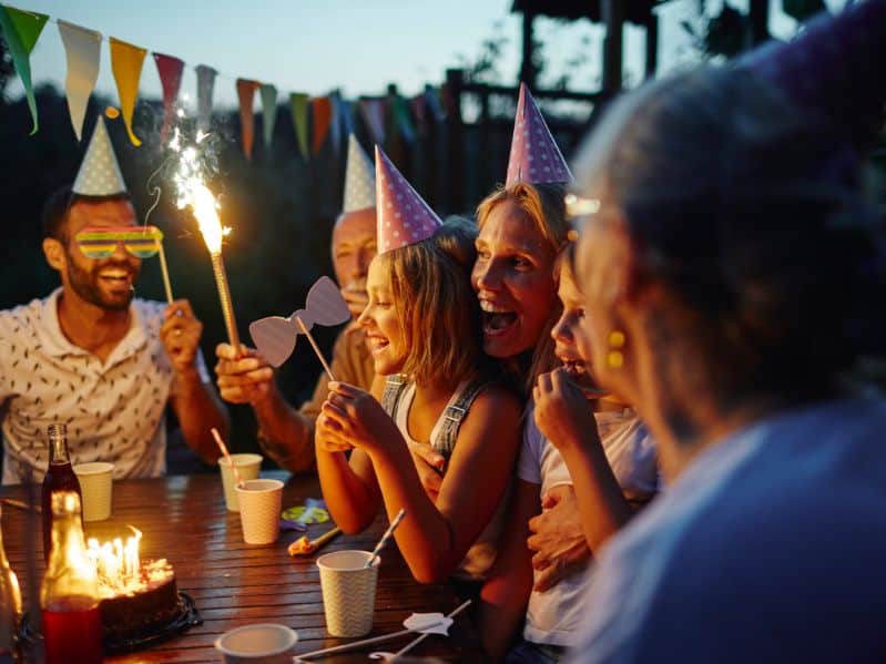 a family celebrating a birthday together