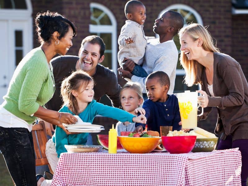 2 families at a backyard anniversary picnic