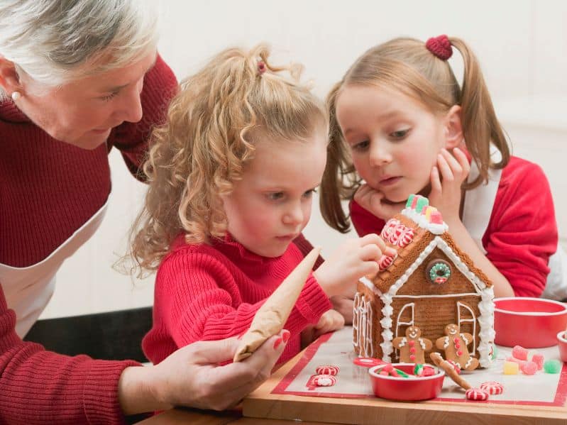 decorating a gingerbread house