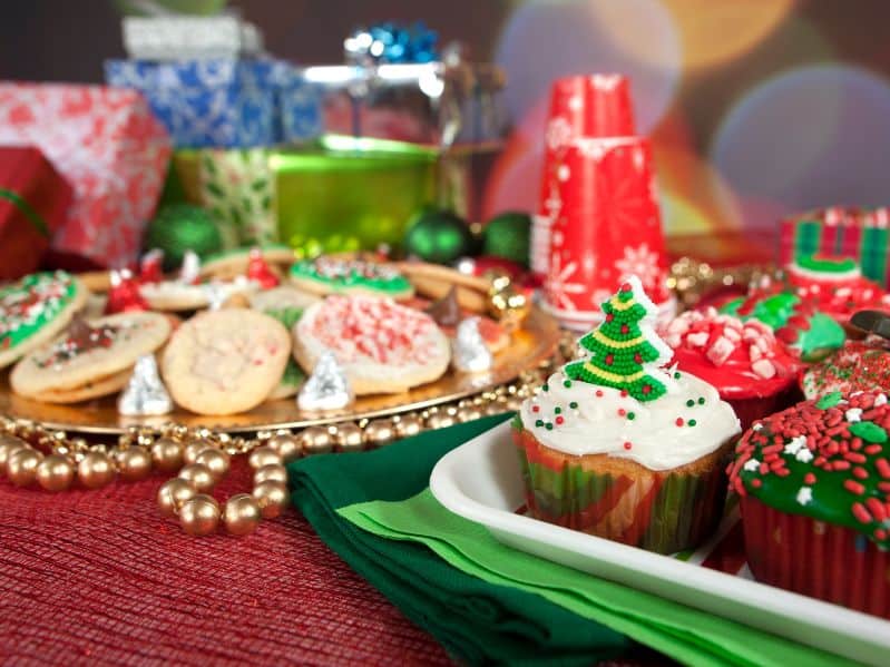 old fashion christmas party spread of cupcakes and cookies